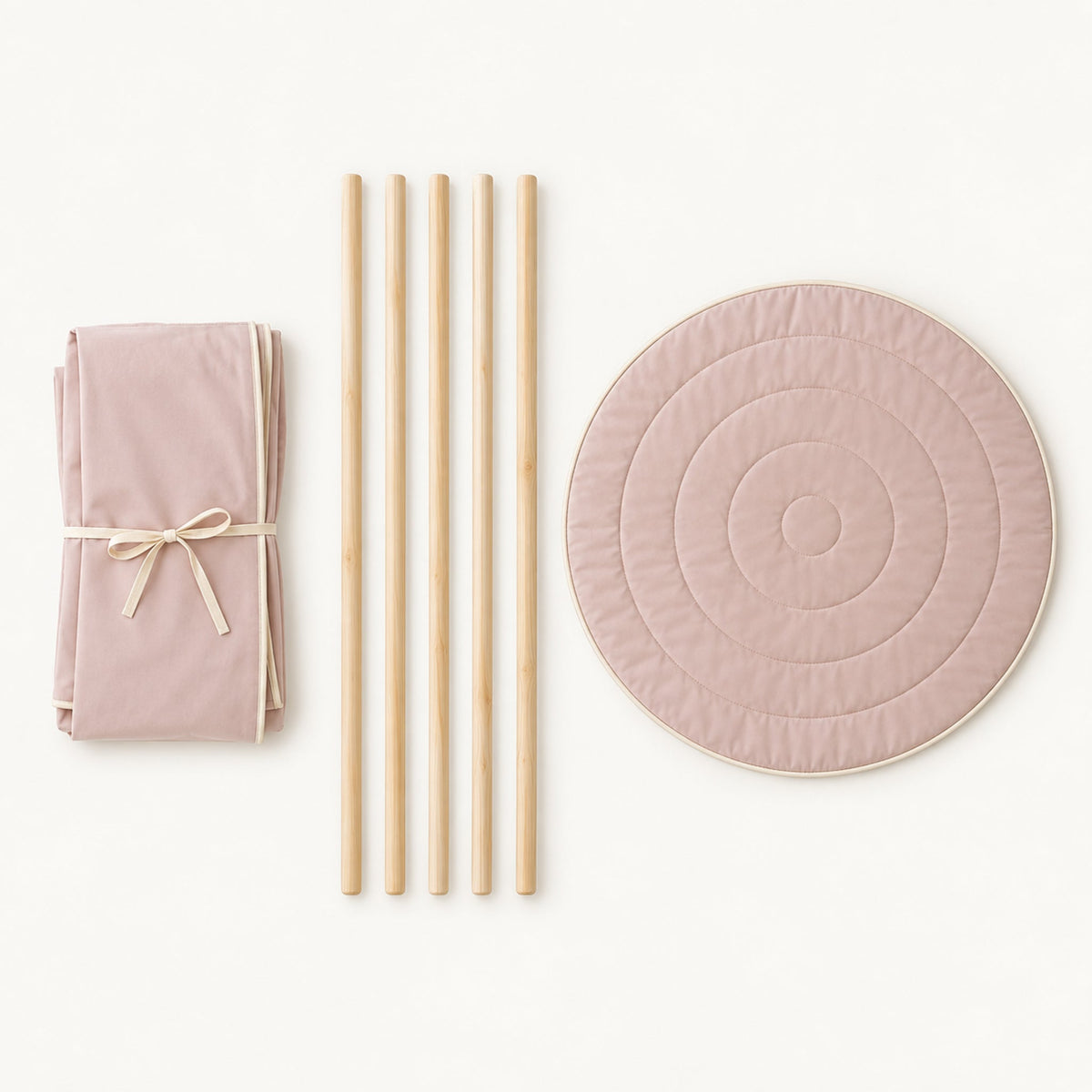 What comes in the box: folded canvas, five pine poles and the round padded mat
