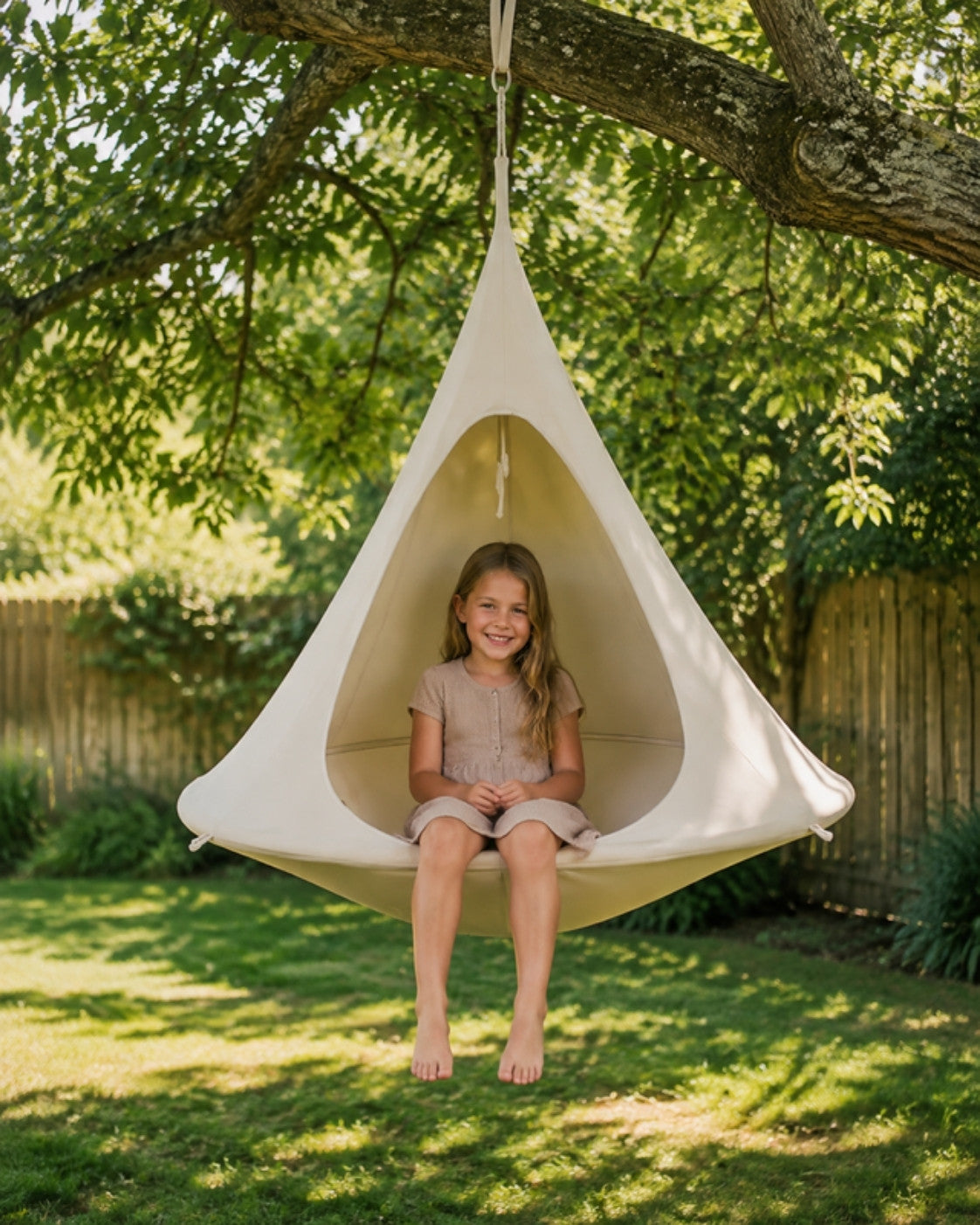 Hanging tipi hammock in the garden