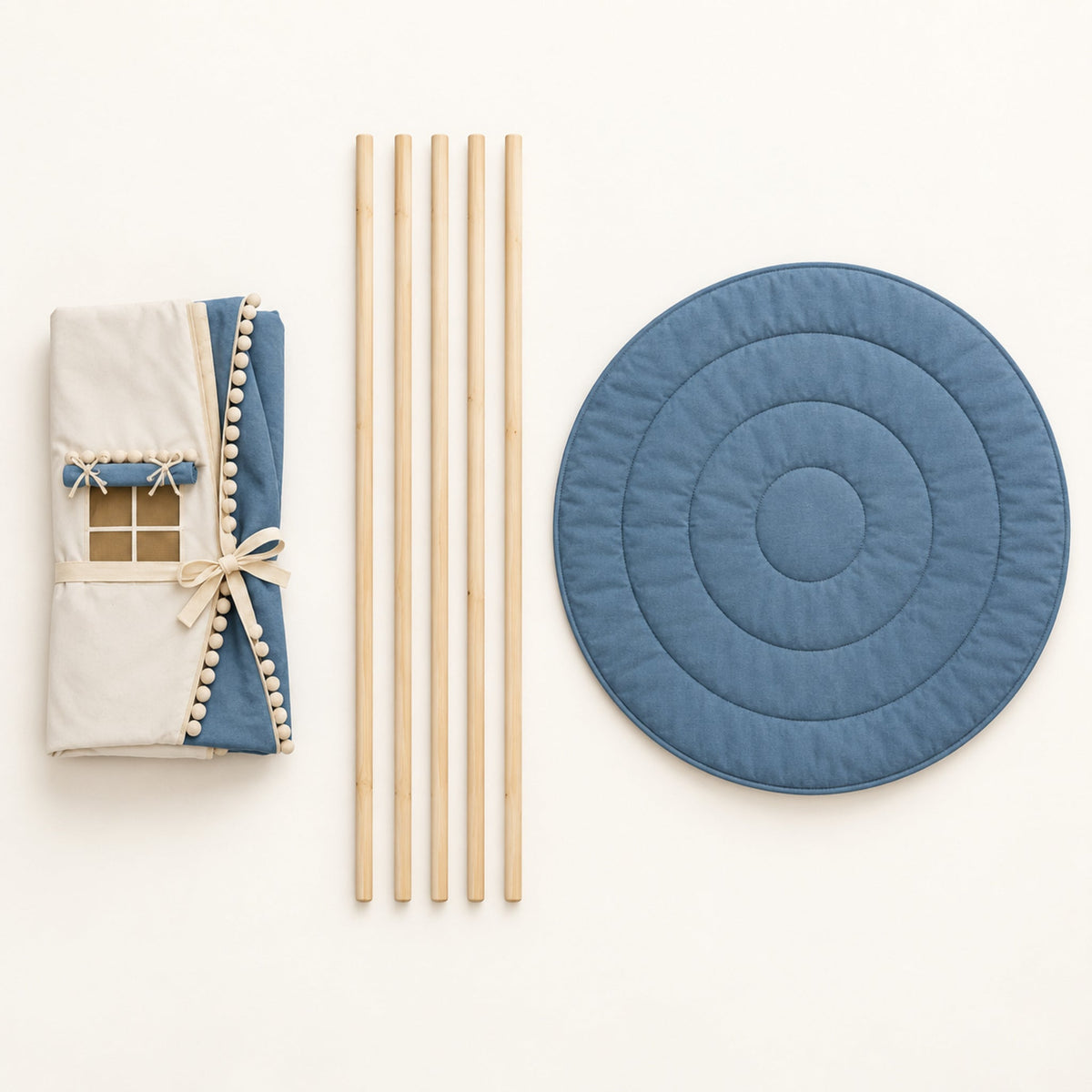 What comes in the box: folded canvas, five pine poles and the round padded mat