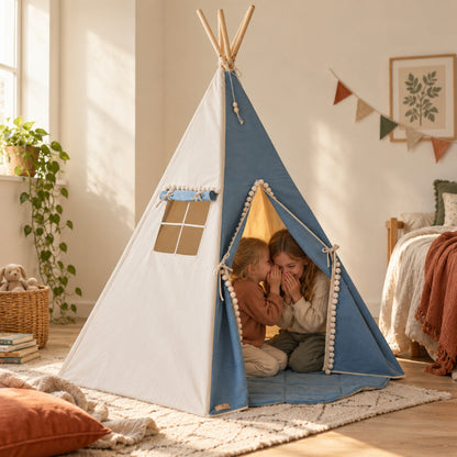 Two children sharing a secret inside the Denim Pompom kids teepee