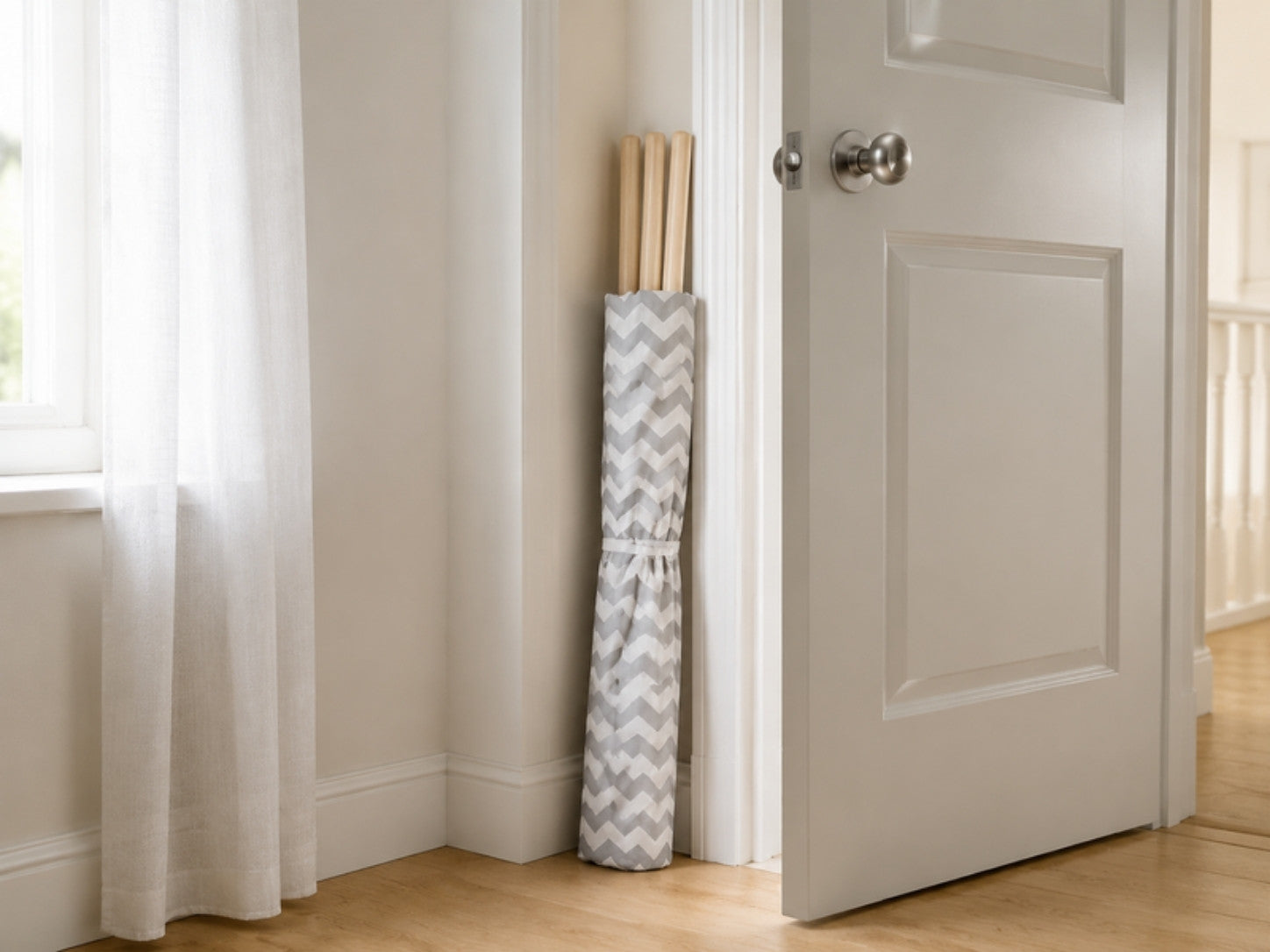 Kids teepee folded flat and stored behind a door