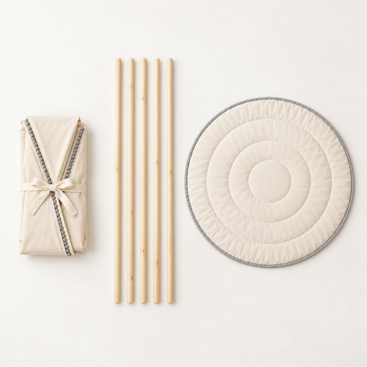 What comes in the box: folded canvas, five pine poles and the round padded mat