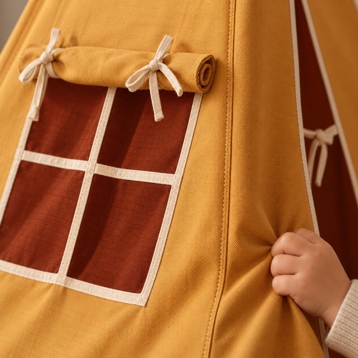 Close-up of the Ochre cotton canvas and cream piping
