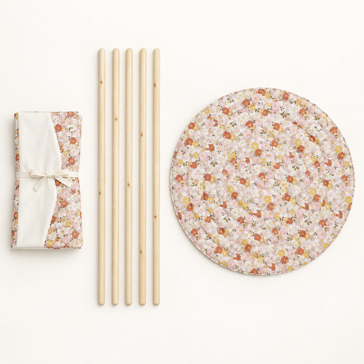 What comes in the box: folded canvas, five pine poles and the round padded mat